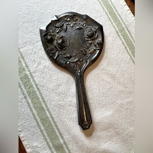 Antique Art Nouveau hand mirror, rose design with a monogram